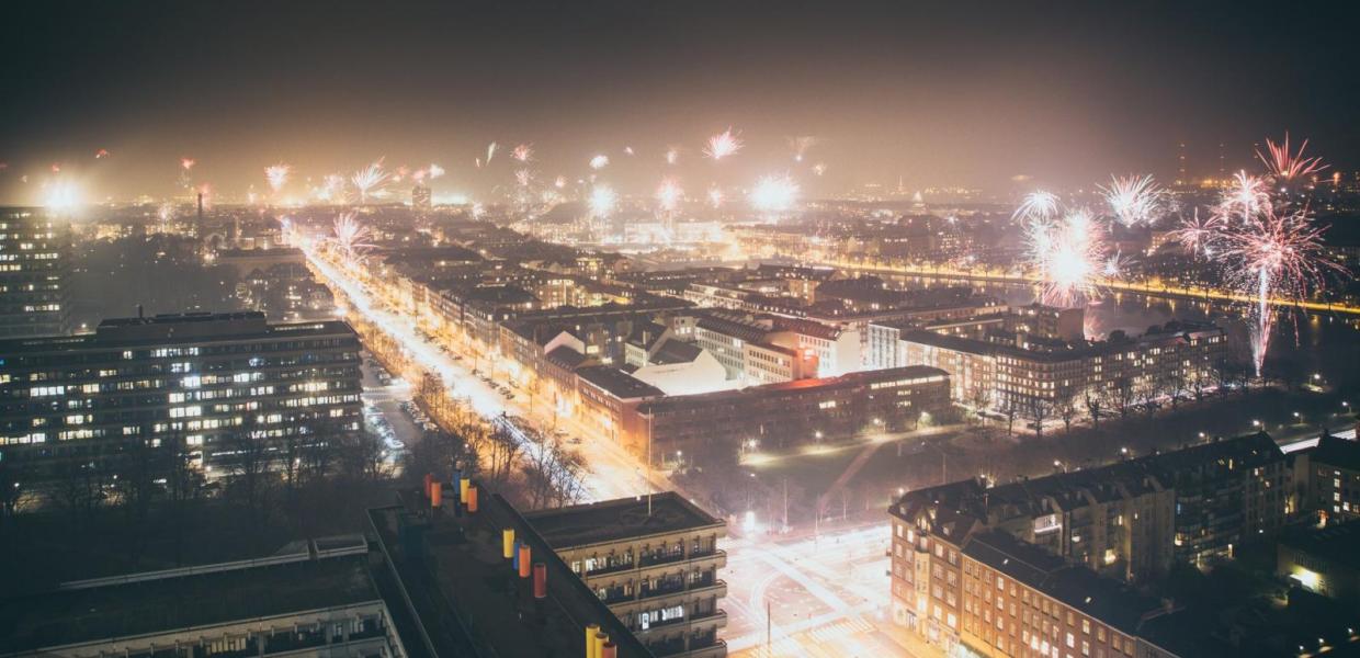 Fireworks going off all over central Copenhagen, Denmark, during New Year’s Eve