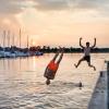 Children jumping in Water at Præstø Havn, Zealand