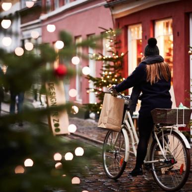 Girl on a bike during Christmas time in Aarhus