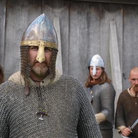 A viking man stares at the camera at Ribe Viking Centre, Denmark